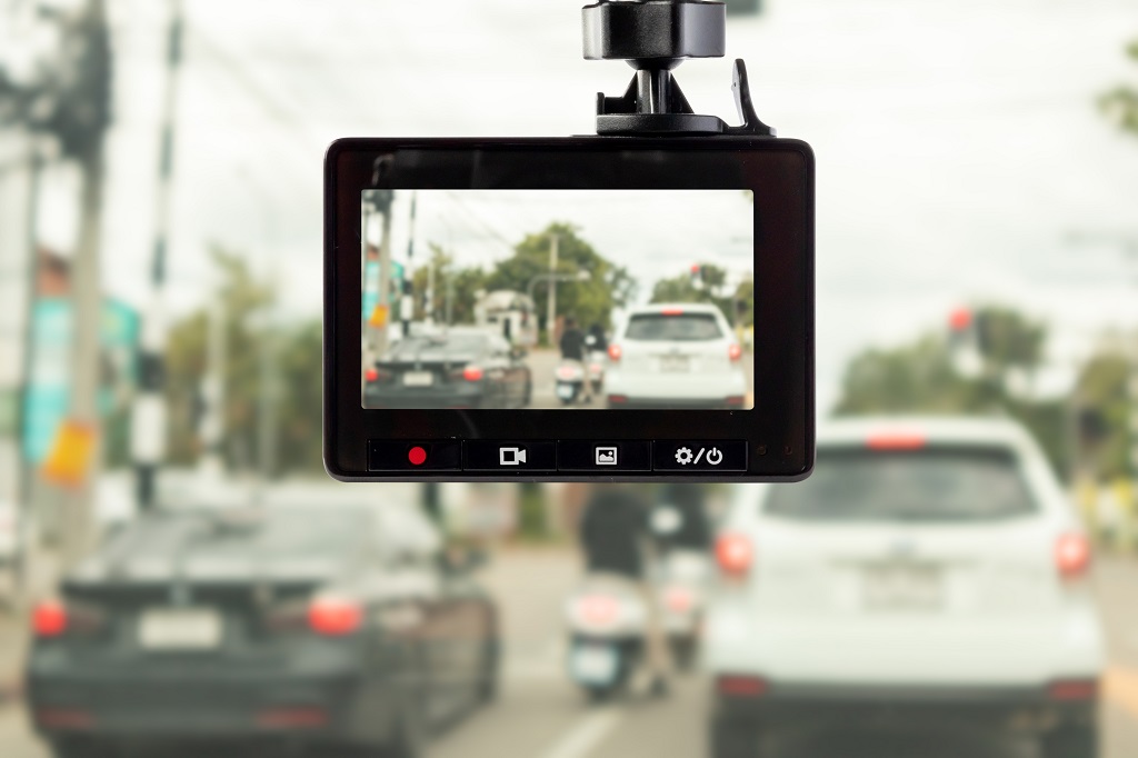 Dash cam recording traffic with clear on-screen display showing road conditions ahead