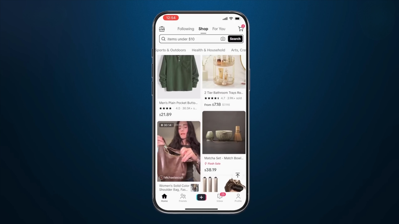 A smartphone shows TikTok Shop product cards for apparel and home goods